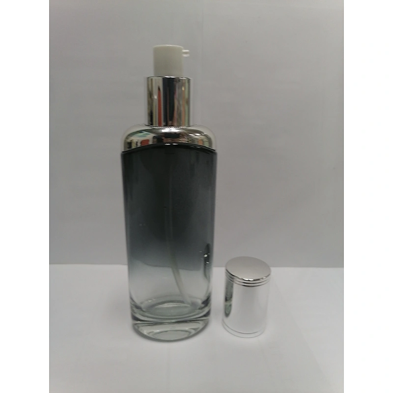 low price with good quality glass cosmetic empty round silver  pump bottles for skincare with  with light silver lid packaging
