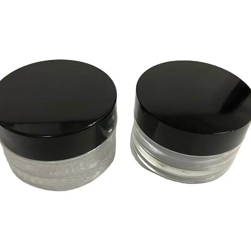 Glass cosmetic jar with metallic lid