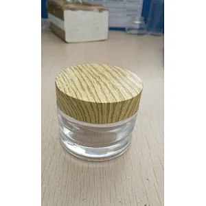 glass cosmetic jar with bamboo looking lid 50ml