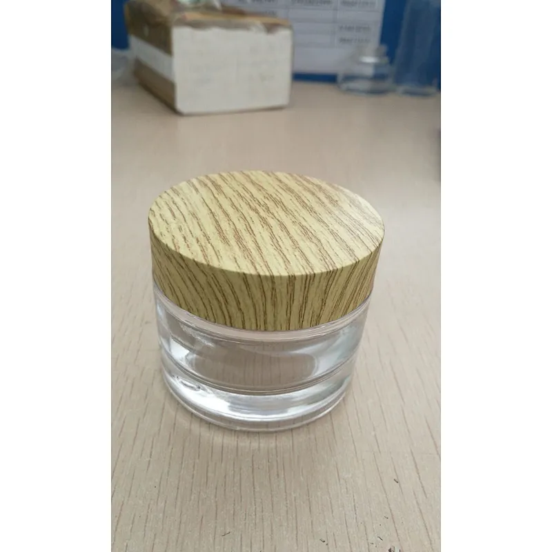 glass cosmetic jar with bamboo looking lid 50ml