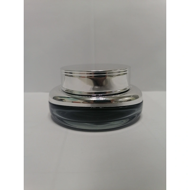 low price with good quality glass cosmetic empty round silver  pump bottles for skincare with  with light silver lid packaging