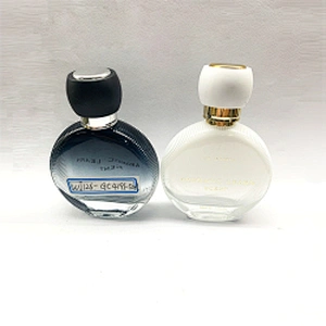 Wholesale exquisite high quality 50ml round glass empty perfume bottle