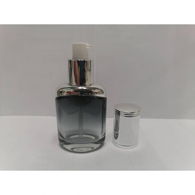 low price with good quality glass cosmetic empty round silver  pump bottles for skincare with  with light silver lid packaging