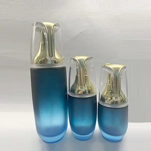 Blue color 40ml 100ml 120ml cosmetic glass lotion bottle with pump