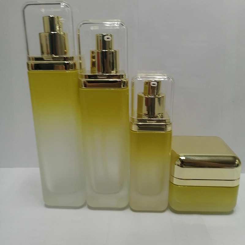 Custom empty glass round clear packaging bottle cosmetic lotion bottle