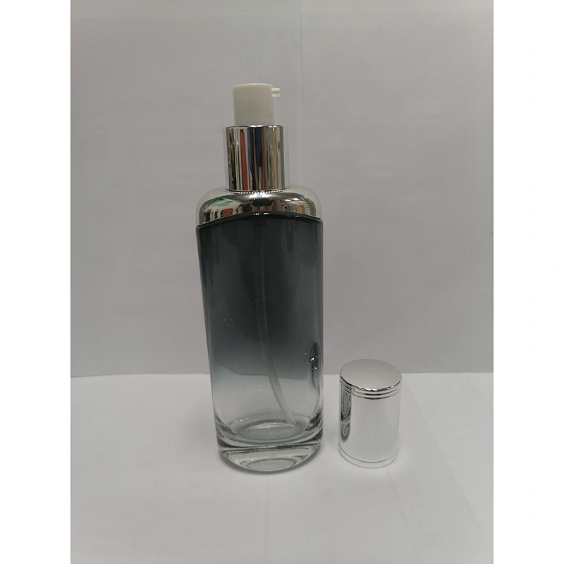 low price with good quality glass cosmetic empty round silver  pump bottles for skincare with  with light silver lid packaging
