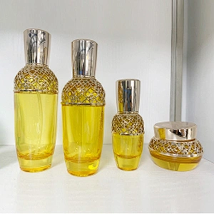 New style luxury  30g 50g 40ml 100ml 120ml cosmetics sub-bottle Mesh cover hollow high-end cosmetic bottle set