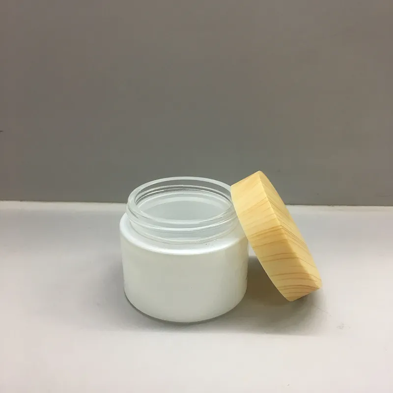 glass cosmetic jar with bamboo looking lid 50ml