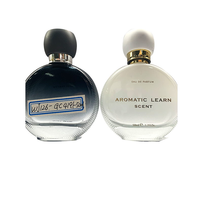 Wholesale exquisite high quality 50ml round glass empty perfume bottle