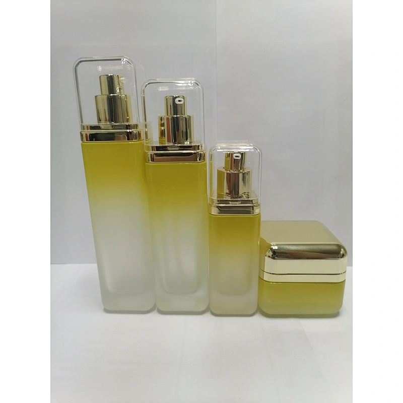 Custom empty glass round clear packaging bottle cosmetic lotion bottle