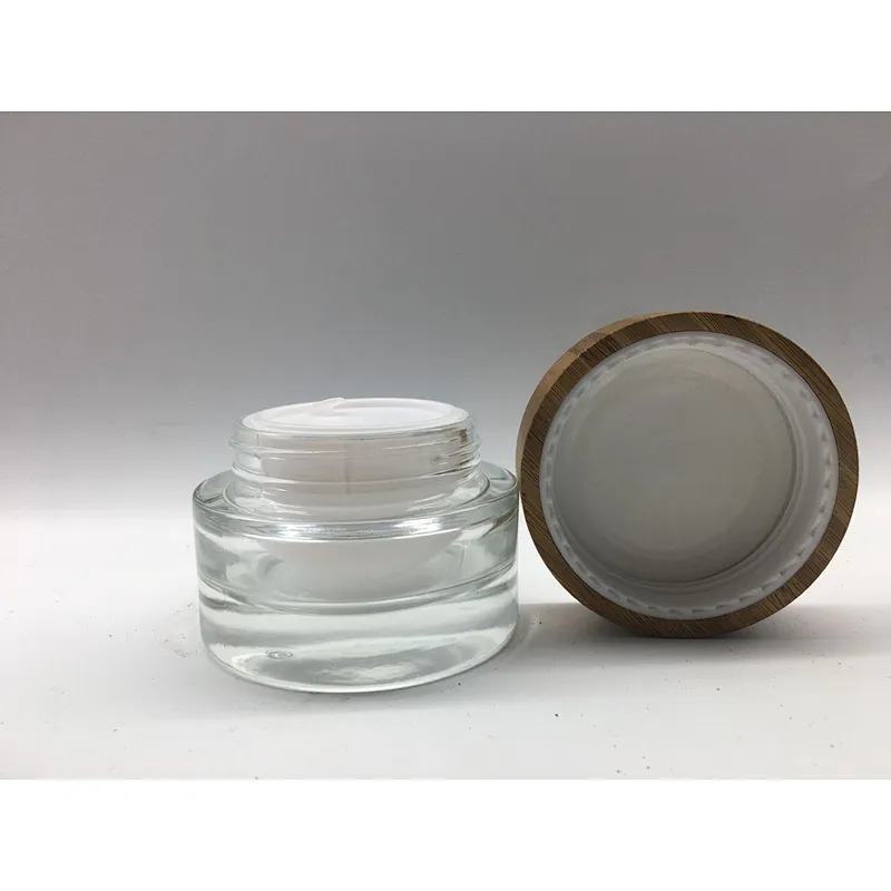 2022 new style eco-friendly bamboo cosmetic glass bottle with linner , bamboo cap engraving logo jar