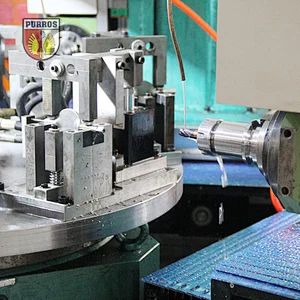 Rotary auto drilling & milling machine for steel butterfly disc
