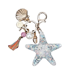 Wholesale high quality fashion custom logo starfish shape key ring shell tassel style car key chain