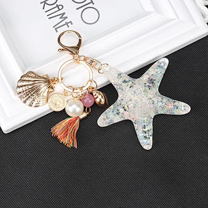 Wholesale high quality fashion custom logo starfish shape key ring shell tassel style car key chain