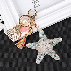 Wholesale high quality fashion custom logo starfish shape key ring shell tassel style car key chain