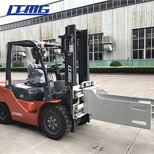 Forklift with bale clamp attachment