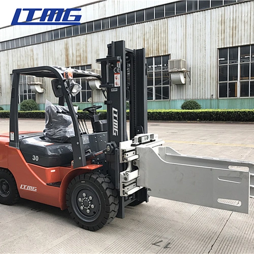 Forklift with bale clamp attachment