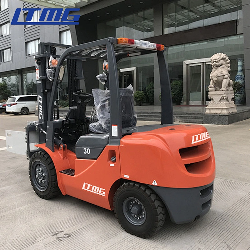 Forklift with bale clamp attachment