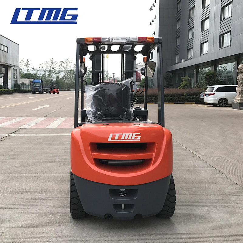 Forklift with bale clamp attachment