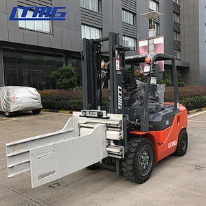Forklift with bale clamp attachment