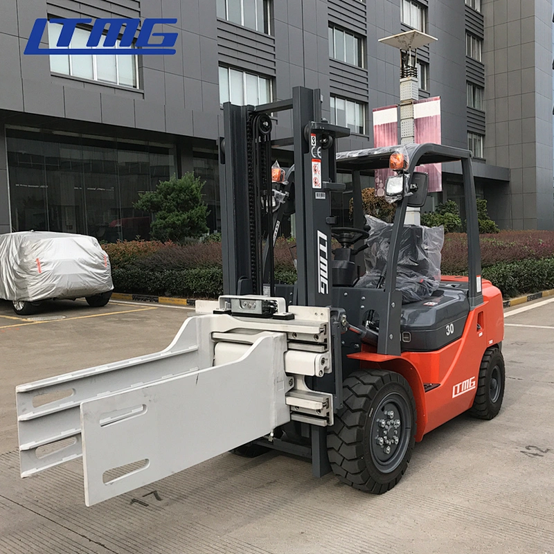 Forklift with bale clamp attachment