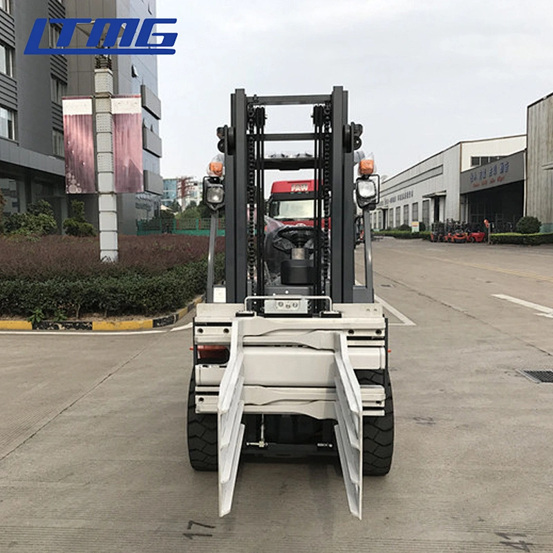Forklift with bale clamp attachment