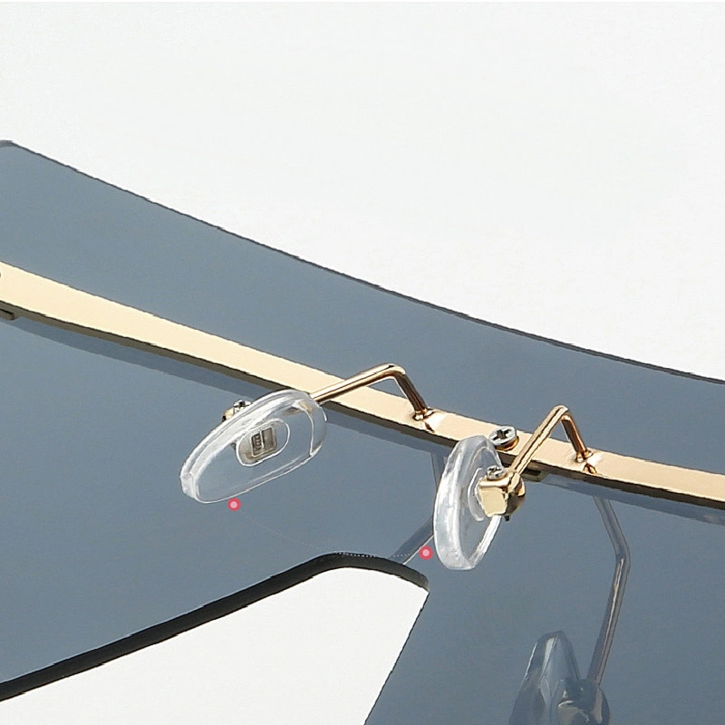 New rimless conjoined sunglasses cross - border European and American fashion sunglasses big frame square sunglasses female