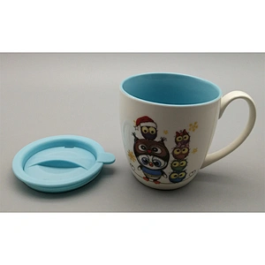 Color inside white outsid mug with two decals with a plastic lid