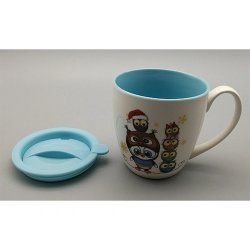 Color inside white outsid mug with two decals with a plastic lid