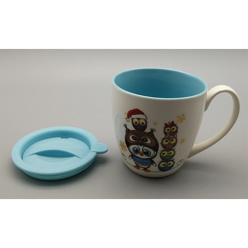 Color inside white outsid mug with two decals with a plastic lid