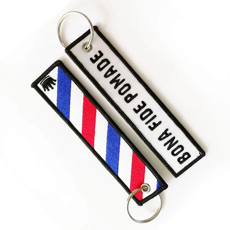 Black embroidered woven keychain with your logo