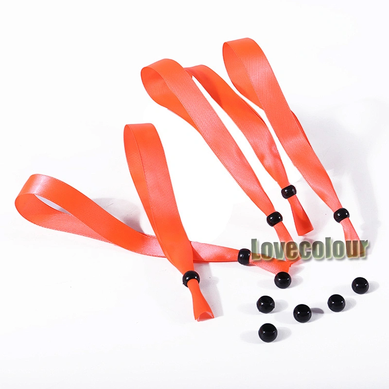 DIY polyester orange fabric wristband with bead closure