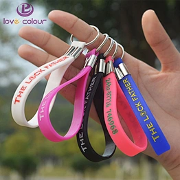 Cheap custom made rubber key chain silicone wristband keychain