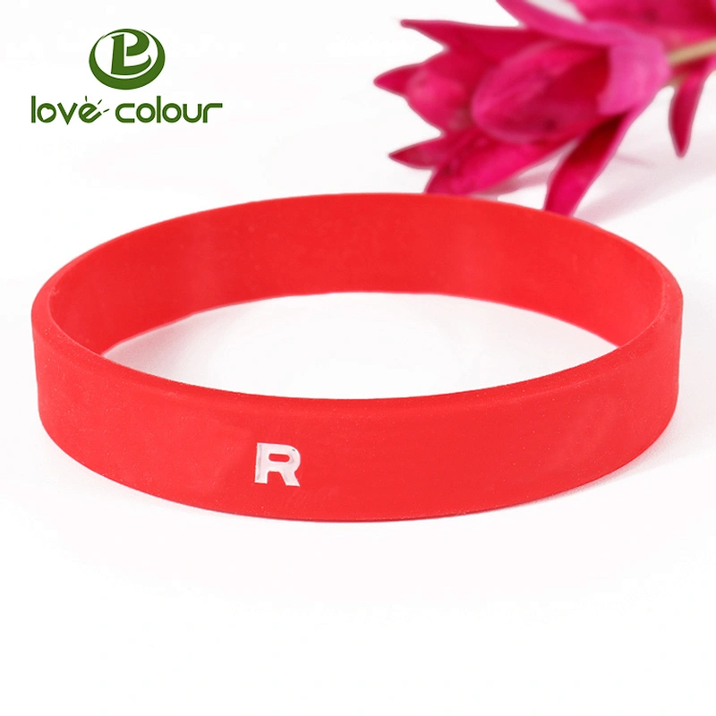 Custom red color debossed silicone wristbands filled with black logo