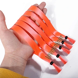 DIY polyester orange fabric wristband with bead closure