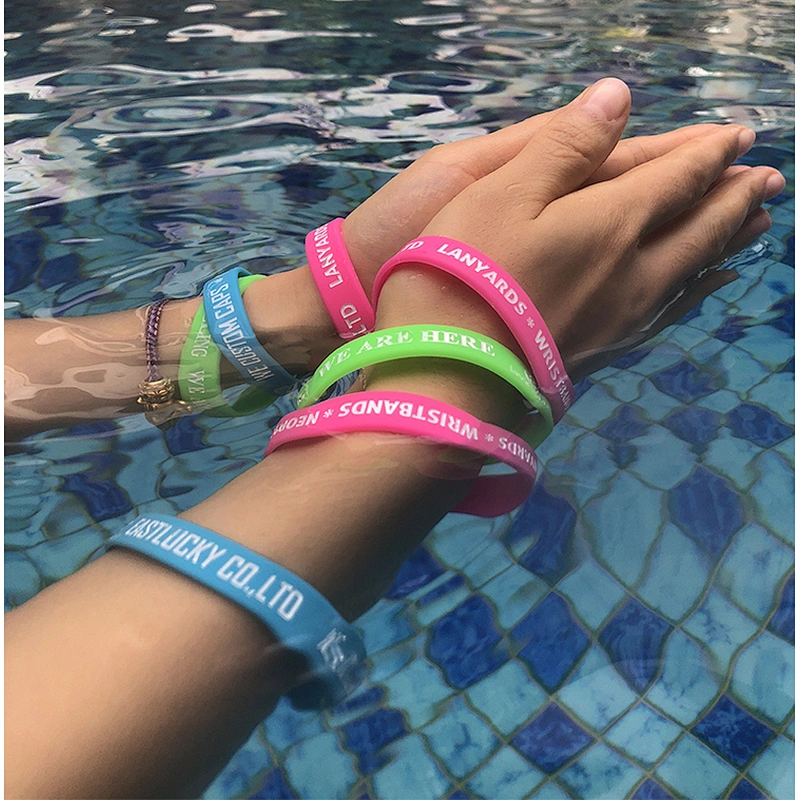 Custom fashion debossed and printing logo silicone wristbands