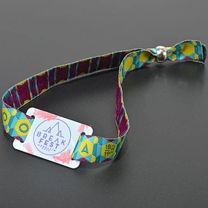 Polyester fabric wristband with hard plastic chip