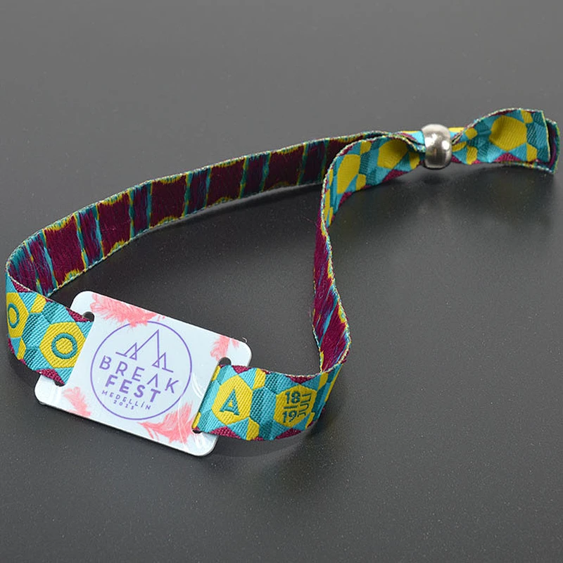 Polyester fabric wristband with hard plastic chip