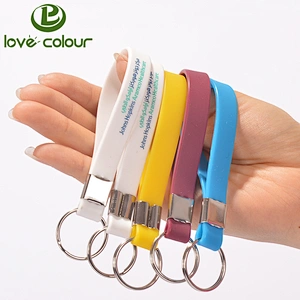 Cheap custom made rubber key chain silicone wristband keychain