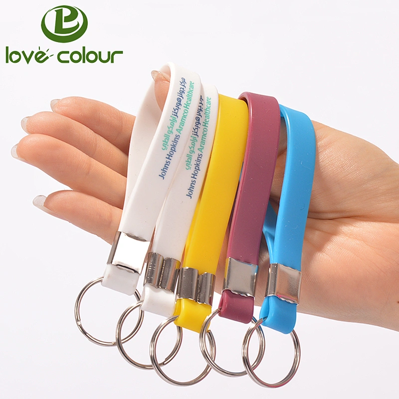 Cheap custom made rubber key chain silicone wristband keychain