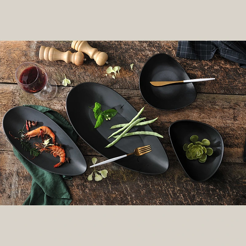 Wholesale black porcelain triangle shallow ceramic bowl