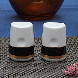 wholesale custom white ceramic salt and pepper shakers with embossed gold black