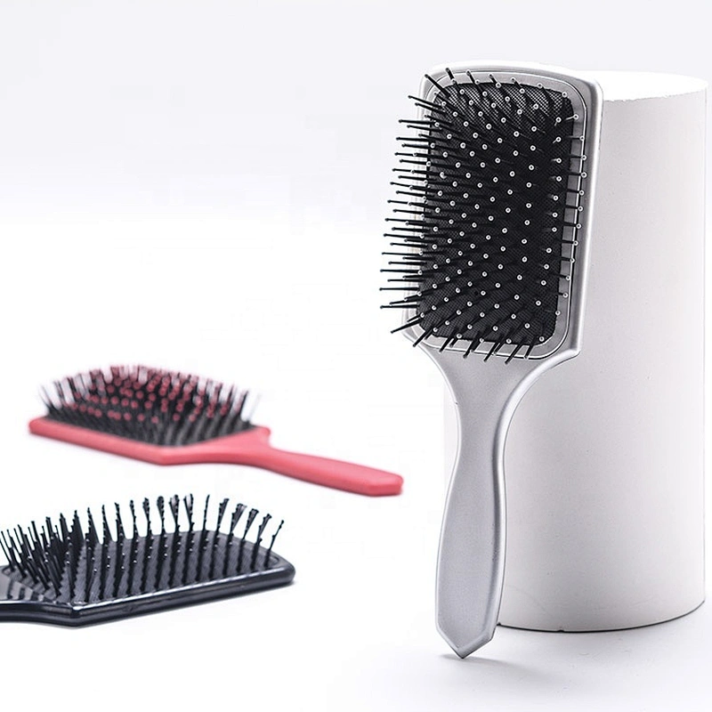 Home care plastic paddle brush custom plastic massage brush detangling hairbrush with nylon bristle