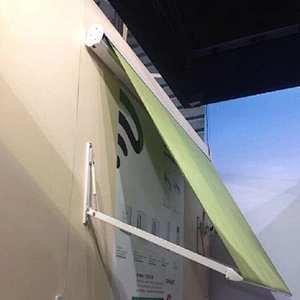 Gas spring swing arm canopy