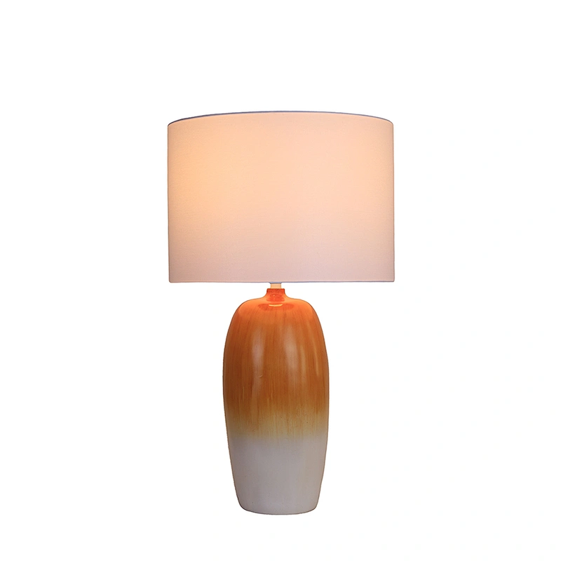 Orange gradient poly lamp body with white linen shade table lamp