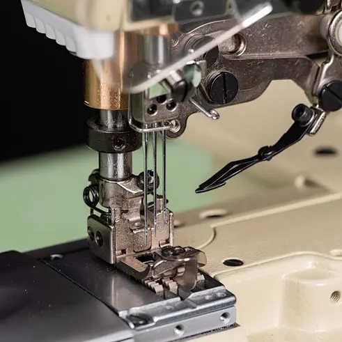 elastic waistband attaching device