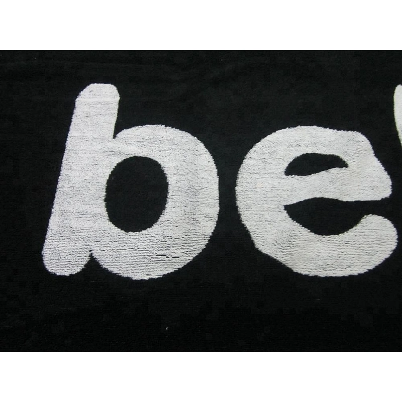 Luxury logo embossed Black and white beach towel logo