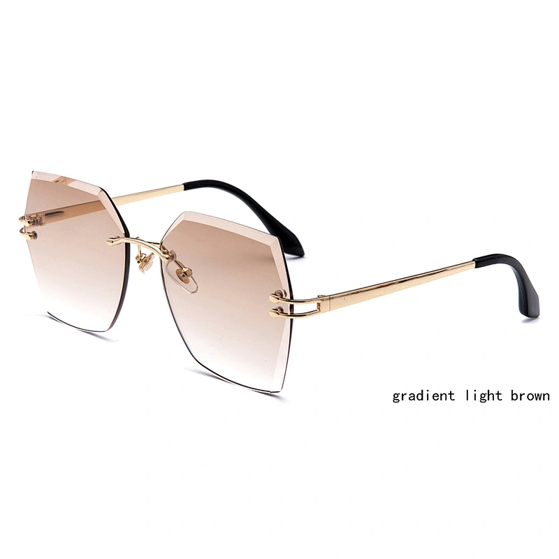 Factory price colorful PC sun glasses cheap promotional ocean lens frame rimless sunglasses