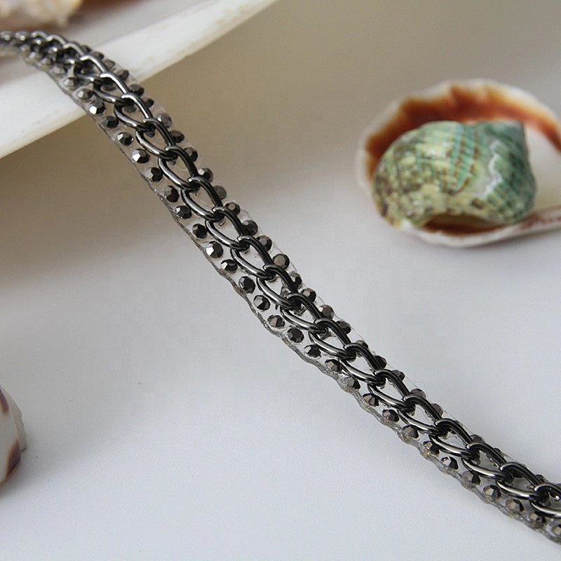 Accessories chain edging clothing trim with iron on melt adhesive backing applied to clothing