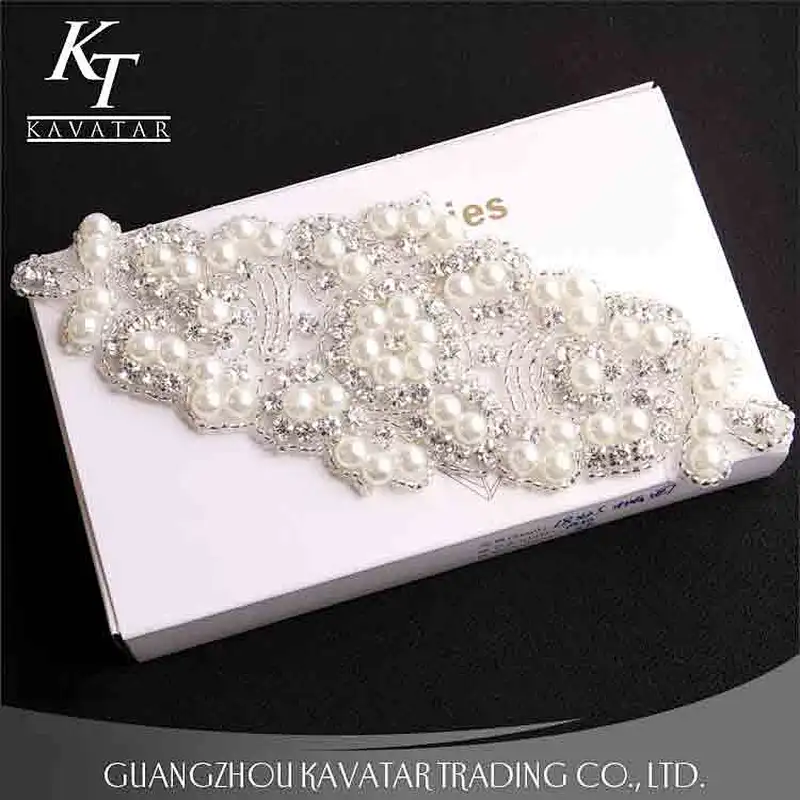 A lot of pearls and crystal sew on voile fabric for wedding dress accessories
